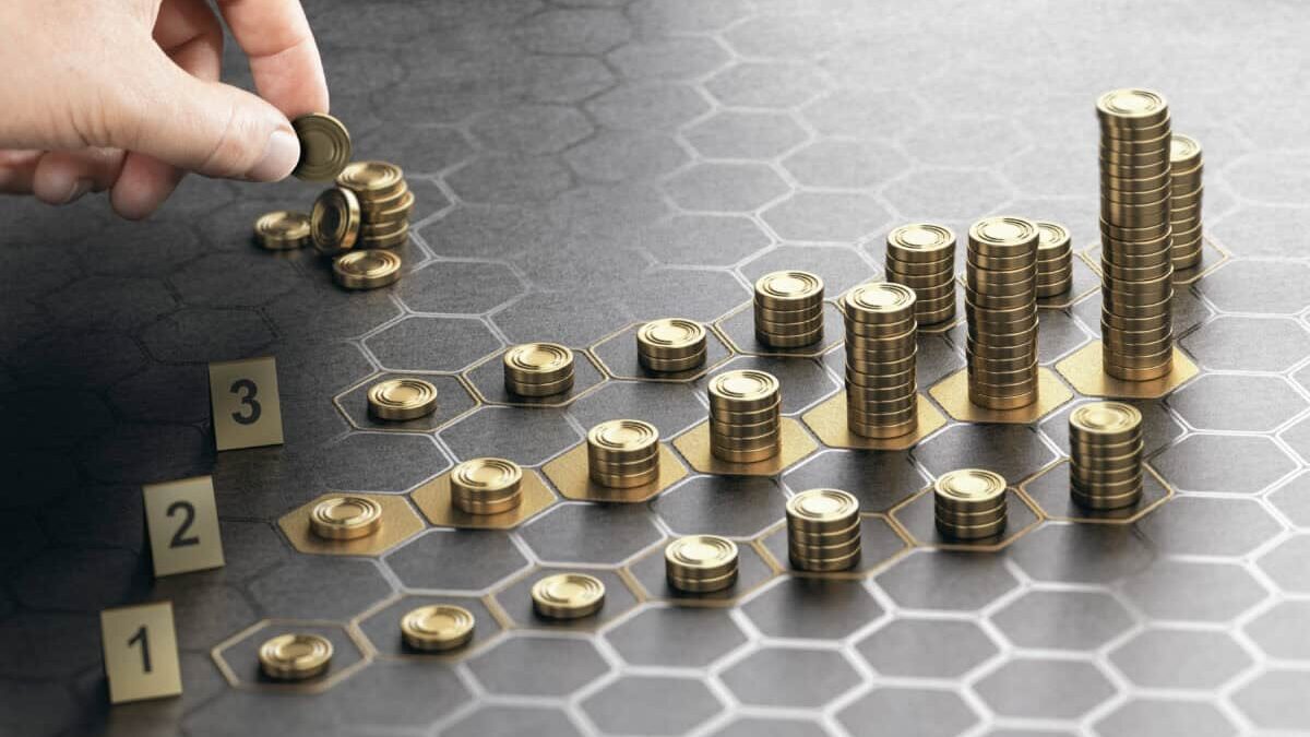 hand stacks coins